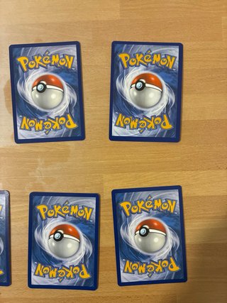 Carte Pokémon: Alakazam, Hypno, Reshiram, ecc.