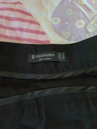Falda pantalón negra plisada