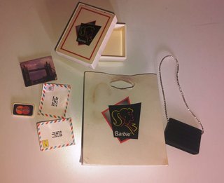 Barbie de tiendas con bolso y bolsa