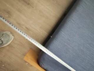 Sofá cama tela y madera