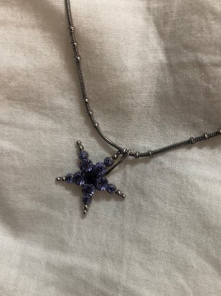Colgante estrella cristal morado y plateado