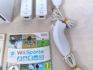 Consola Nintendo Wii + Juegos y Accesorios