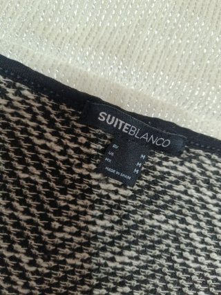Chaqueta tejida blanco y negro