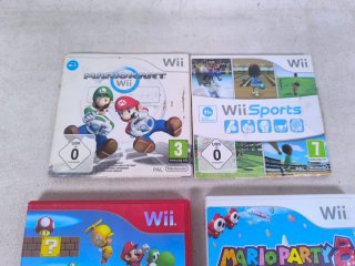 Pacchetto 4 Giochi Wii: Mario Kart, Sports, Party 8, New Super Mario Bros. Wii
