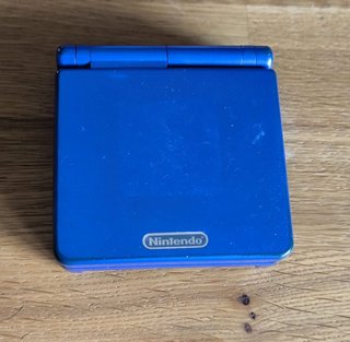 GameBoy Advance SP + Pokemon Rubi