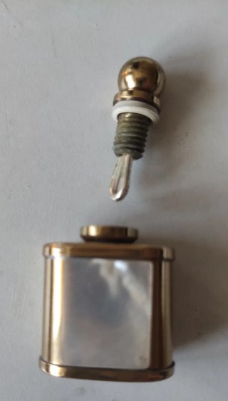 Monedero, medalla y pulsera de monedas
