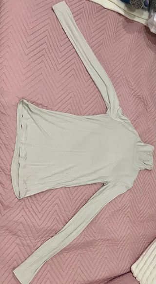 Jersey cuello vuelto ajustado beige