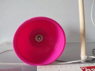Diabolo rosa con bastoni