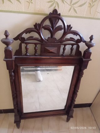 Espejo de madera tallada