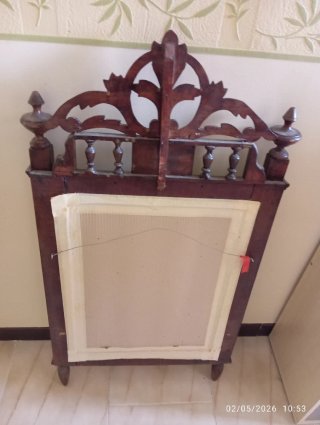 Espejo de madera tallada