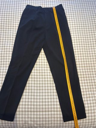 Pantalón de traje negro con pinzas