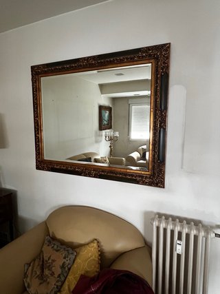 Espejo de pared grande con marco decorado