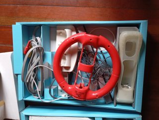 Nintendo Wii + Accesorios y Juegos