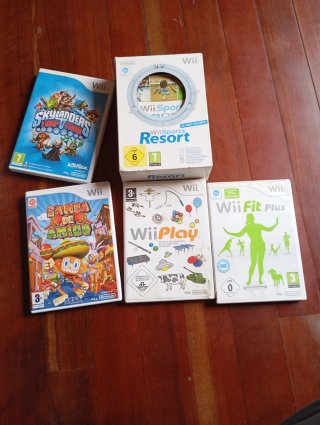 Nintendo Wii + Accesorios y Juegos