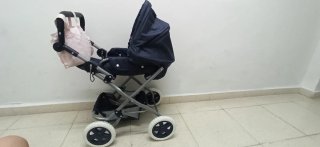 Cochecito de muñecas con capazo