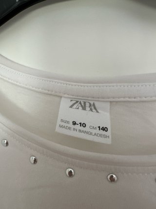 Camiseta blanca niña con flecos