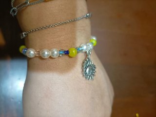 Bracciale perline con ciondolo sole