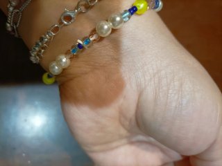 Bracciale perline con ciondolo sole