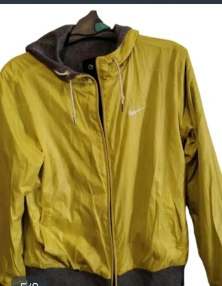Chaqueta Nike reversible gris y amarilla