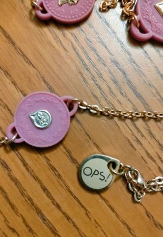 Collana Ops! nuova oro e fucsia