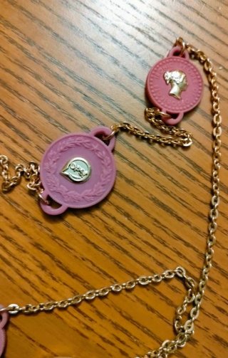 Collana Ops! nuova oro e fucsia