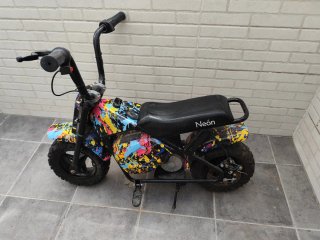 Moto Eléctrica Infantil Neón Diseño Salpicadura