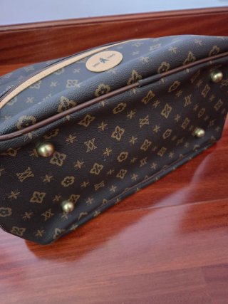 Bolso de viaje John Travel marrón