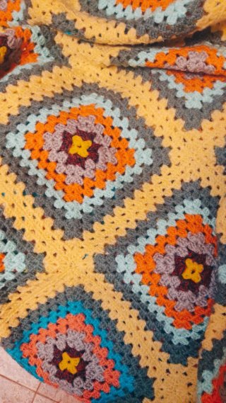 Manta tejida a mano estilo patchwork