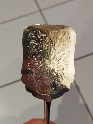 Pinza da portata in metallo argentato