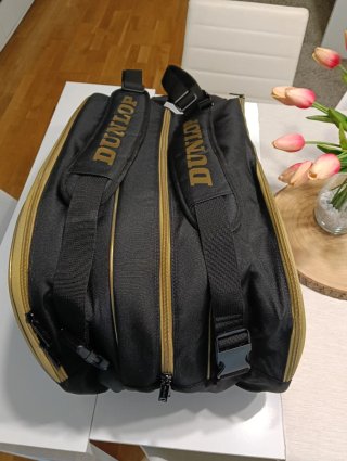 Paletero Dunlop Elite Negro y Dorado