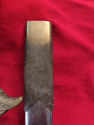 Espada decorativa con borla
