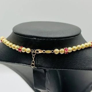 COLLAR BOLITAS CON CIRCONITAS ROJAS. Oro 18K.