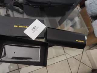 Occhiali da sole Balenciaga BB neri e oro