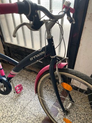 Bicicleta BTWIN rosa e blu per bambina