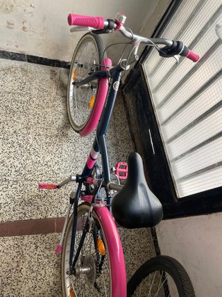 Bicicleta BTWIN rosa e blu per bambina