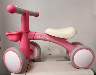Bicicleta de equilibrio infantil rosa sin pedales