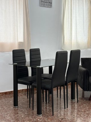 Sofá cama + mesa y 4 sillas pack en oferta