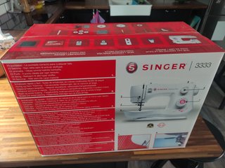 Máquina de coser Singer 3333 En su caja sin abrir.