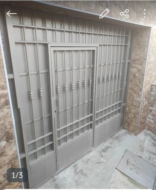 Puerta metálica cochera
