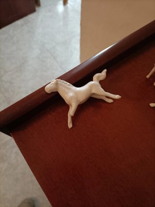 Caballitos de porcelana antiguos