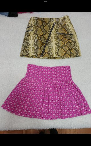 Lote de faldas: azul, negra, serpiente, floral.