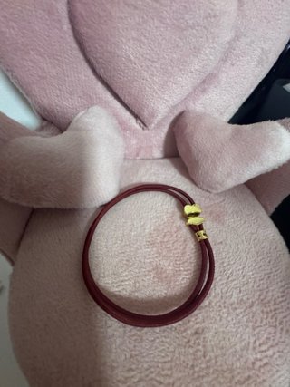 Pulsera Tous granate con osito de oro