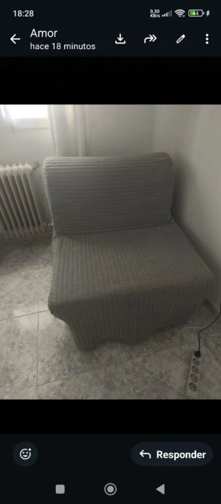 Sofá cama gris de tela