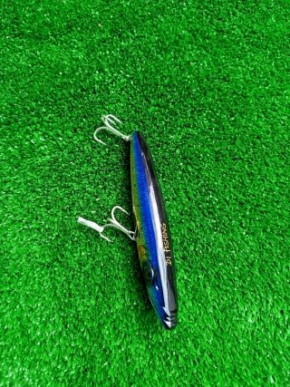 Señuelos de pesca paseantes, Spinning