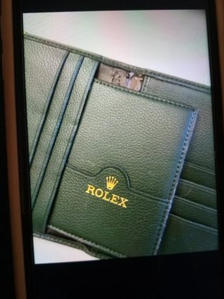 Porta documenti Rolex verde con angoli oro