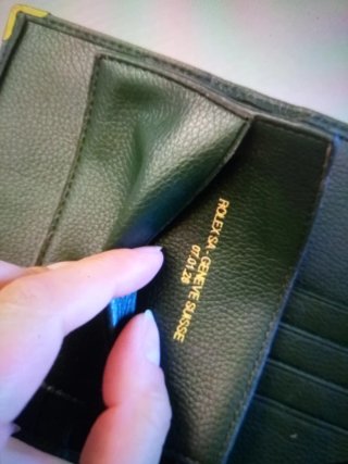 Porta documenti Rolex verde con angoli oro