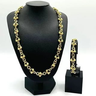 Pulsera dorada con eslabones y cuentas