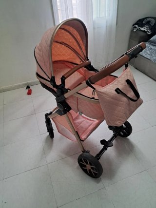 Cochecito de bebé rosa