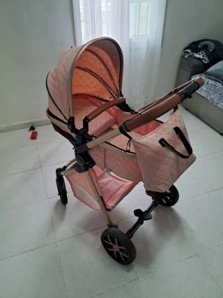 Cochecito de bebé rosa