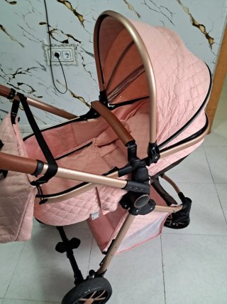 Cochecito de bebé rosa